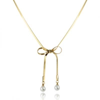 ECARLA naszyjnik ze stali szlachetnej pozłacanej KOKARDA perły NST2184