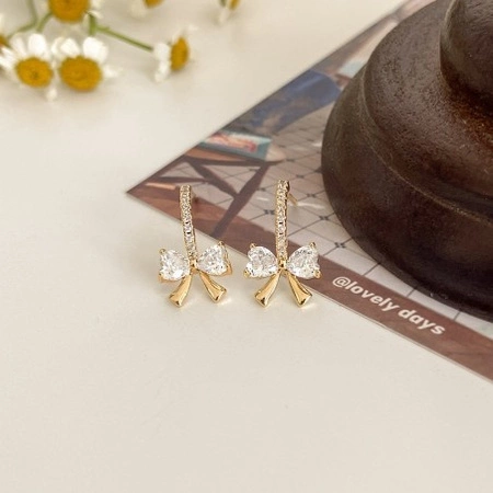 ECARLA kolczyki ze stali szlachetnej platerowanej 14k złotem KOKARDKA KST3330