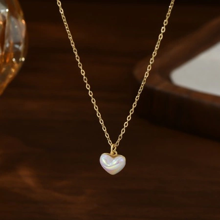 ECARLA naszyjnik ze stali szlachetnej pozłacanej SERCE masa perłowa NST2170