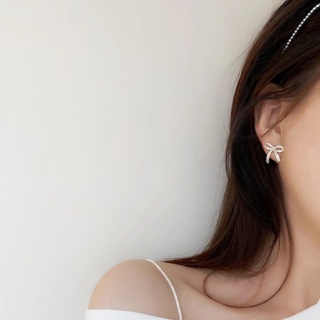 ECARLA kolczyki ze stali szlachetnej platerowanej 14k złotem KOKARDKA KST3329