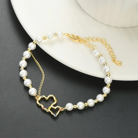 ECARLA bransoletka na rękę ze stali chirurgicznej pozłacanej PEREŁKI SERCA BST1531