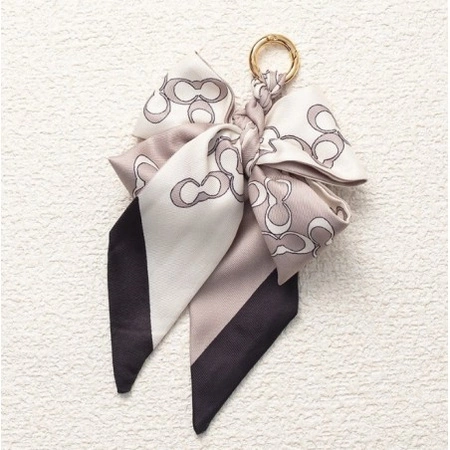 ECARLA brelok do kluczy lub torebki Elegancka kokarda Beż BRL373